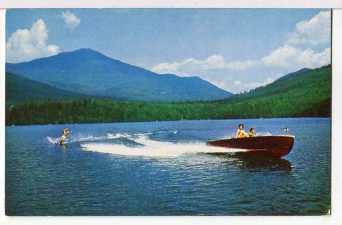 Water skiing behind wood - behind,